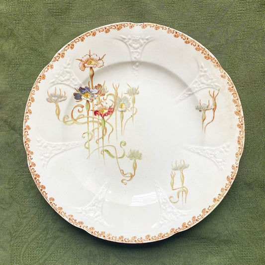 Plat en terre de fer polychrome Nielles Longwy