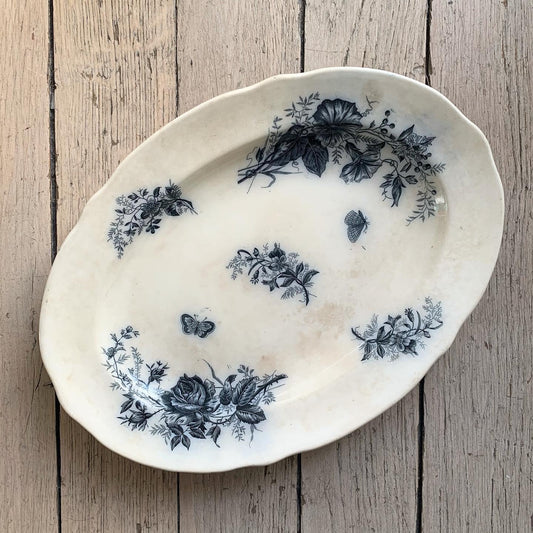 Plat terre de fer motif fleuri noir