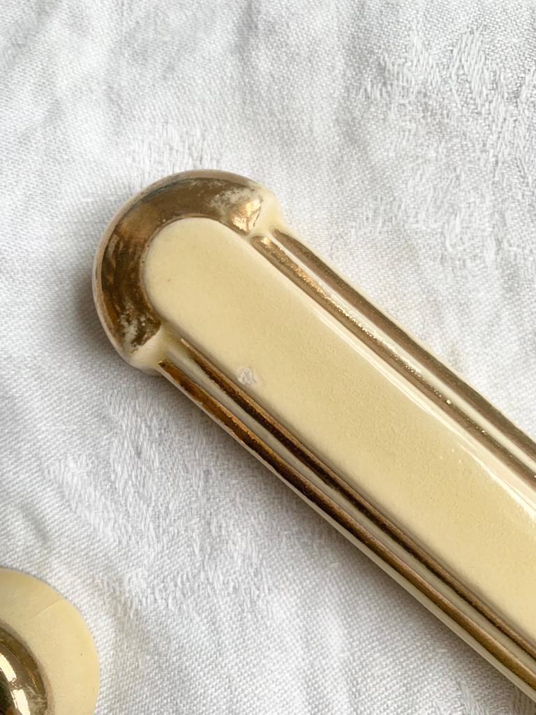 Cream and gold knife holder